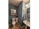 Cozy half bathroom featuring blue walls and a pedestal sink at 3109 Windgate Dr, Buford, GA 30519