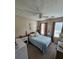 Inviting bedroom with natural light, floral accents, and a ceiling fan at 3109 Windgate Dr, Buford, GA 30519