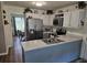 Kitchen view with stainless steel appliances, ample counter space and updated cabinets at 3109 Windgate Dr, Buford, GA 30519