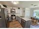 Well-lit kitchen features stainless steel appliances, plenty of counter space, and a cozy breakfast nook at 3109 Windgate Dr, Buford, GA 30519