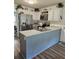 Kitchen featuring stainless steel appliances and countertops, with a functional island and ample storage at 3109 Windgate Dr, Buford, GA 30519