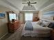 Spacious bedroom with a tray ceiling, and dresser at 3109 Windgate Dr, Buford, GA 30519