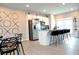Modern kitchen featuring stainless steel appliances, granite countertops, and an island, perfect for culinary enthusiasts at 3615 Hawthorne Terrace, Atlanta, GA 30337