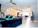 Open-concept living room with stylish decor, hardwood floors, and recessed lighting, ideal for entertaining and relaxation at 3615 Hawthorne Terrace, Atlanta, GA 30337