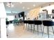 Open-concept living space with a modern kitchen island and recessed lighting, creating a welcoming atmosphere at 3615 Hawthorne Terrace, Atlanta, GA 30337