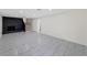Open basement area with fireplace and stairs at 466 Thackery Sw Pl, Atlanta, GA 30311