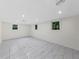 Spacious finished basement with tile floors and recessed lighting at 466 Thackery Sw Pl, Atlanta, GA 30311