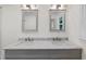 Elegant bathroom featuring a double sink vanity with marble countertop at 466 Thackery Sw Pl, Atlanta, GA 30311