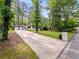 This charming home boasts a long driveway and a two-car garage at 466 Thackery Sw Pl, Atlanta, GA 30311