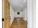 View of the entryway with natural light and hardwood floors at 466 Thackery Sw Pl, Atlanta, GA 30311