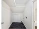 Convenient laundry room featuring wood-look tile flooring at 466 Thackery Sw Pl, Atlanta, GA 30311