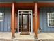 Inviting front entrance boasting a stylish door and decorative columns with the house number at 1255 Plaza Sw Ave, Atlanta, GA 30310