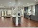 Open concept kitchen with gray cabinets and large island overlooking the living area at 1255 Plaza Sw Ave, Atlanta, GA 30310