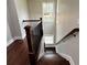 Staircase with stained wood steps and railings at 1255 Plaza Sw Ave, Atlanta, GA 30310