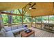 Covered outdoor deck with comfortable seating and an expansive backyard view at 1837 Lochlomand Se Ln, Smyrna, GA 30080