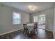 Cozy dining area features sliding glass doors to outdoor deck and natural light at 1837 Lochlomand Se Ln, Smyrna, GA 30080