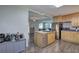 Bright kitchen with stainless steel appliances, center island, and wood cabinetry at 1837 Lochlomand Se Ln, Smyrna, GA 30080