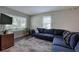 Inviting living room features a large window, comfortable seating, and a stylish decor at 1837 Lochlomand Se Ln, Smyrna, GA 30080