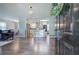 Open-concept living space showcasing a modern kitchen with island, dining area, and comfortable seating at 1837 Lochlomand Se Ln, Smyrna, GA 30080