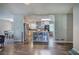 Bright, open-concept living space featuring dark wood floors and modern kitchen with island at 1837 Lochlomand Se Ln, Smyrna, GA 30080