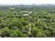 An aerial shot overlooking the tree lined streets and residential homes at 1864 Madrona Nw St, Atlanta, GA 30318