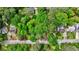 Aerial view of the neighborhood showcasing tree lined streets and the homes below at 1864 Madrona Nw St, Atlanta, GA 30318