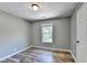 Neutral bedroom with natural light and modern floors at 4751 Shay Ter, Buford, GA 30519