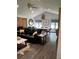 Bright and open living space with a vaulted ceiling, modern fixtures, and a seamless flow to dining area at 5526 Stoneleigh Ct, Stone Mountain, GA 30088