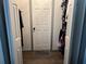 Walk-in closet with hanging storage at 5526 Stoneleigh Ct, Stone Mountain, GA 30088
