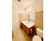 Bathroom featuring a vanity with sink, tile floors, and a toilet at 665 Roxford Ln, Buford, GA 30518