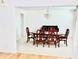 Elegant dining room with chandelier and formal dining set at 665 Roxford Ln, Buford, GA 30518
