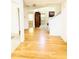 Inviting foyer with hardwood floors and views into other living spaces at 665 Roxford Ln, Buford, GA 30518