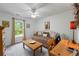 Bedroom with a daybed, desk, neutral-toned walls, and a view of the yard at 1301 Ficklen Church Way, Canton, GA 30114