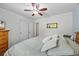 Bedroom with bed and dresser, doors to the hallway and closet can be seen at 1301 Ficklen Church Way, Canton, GA 30114