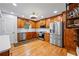 Well-equipped kitchen featuring stainless steel appliances, hardwood floors, and ample cabinet space at 1301 Ficklen Church Way, Canton, GA 30114