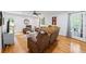 Living room features hardwood flooring, leather furniture, and natural light at 1301 Ficklen Church Way, Canton, GA 30114