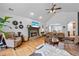 Inviting living room with stone fireplace, hardwood floors, vaulted ceilings, and stylish furnishings at 1301 Ficklen Church Way, Canton, GA 30114
