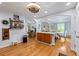 Open-concept living spaces featuring hardwood floors, comfortable seating, and an eat-in kitchen at 1301 Ficklen Church Way, Canton, GA 30114