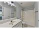 Bathroom with vanity, mirror, toilet, and shower-tub combination at 3805 Roxwood Park Dr, Buford, GA 30518