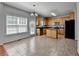 Eat-in kitchen features an island, stainless appliances, granite counters and ample counter space at 3805 Roxwood Park Dr, Buford, GA 30518
