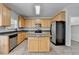 The gourmet kitchen features granite counters, stainless appliances, and a convenient center island at 3805 Roxwood Park Dr, Buford, GA 30518
