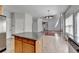 Open floor plan includes a kitchen island and connects to a spacious living area at 3805 Roxwood Park Dr, Buford, GA 30518