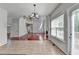 Living room with high ceilings, hardwood floors, and lots of natural light at 3805 Roxwood Park Dr, Buford, GA 30518