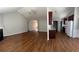 Open-concept living space with hardwood floors and natural light at 802 Village Pl, Loganville, GA 30052