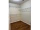 A walk-in closet with wired shelving for maximum storage capacity at 802 Village Pl, Loganville, GA 30052
