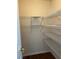 A walk-in closet with wired shelving for maximum storage capacity at 802 Village Pl, Loganville, GA 30052