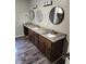 Bathroom featuring granite countertops, and dual sinks at 125 Toccoa Rd, Carrollton, GA 30116