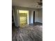 Bedroom with spacious closet, updated flooring, neutral walls, and ceiling fan at 125 Toccoa Rd, Carrollton, GA 30116