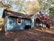 Exterior side-view showcasing the home's deck and well-kept yard at 125 Toccoa Rd, Carrollton, GA 30116