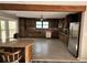 Well-equipped kitchen with wood cabinetry and stainless steel appliances at 125 Toccoa Rd, Carrollton, GA 30116